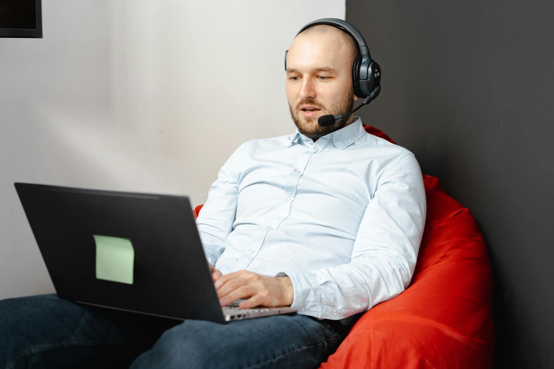A man listening to a transcribed audio