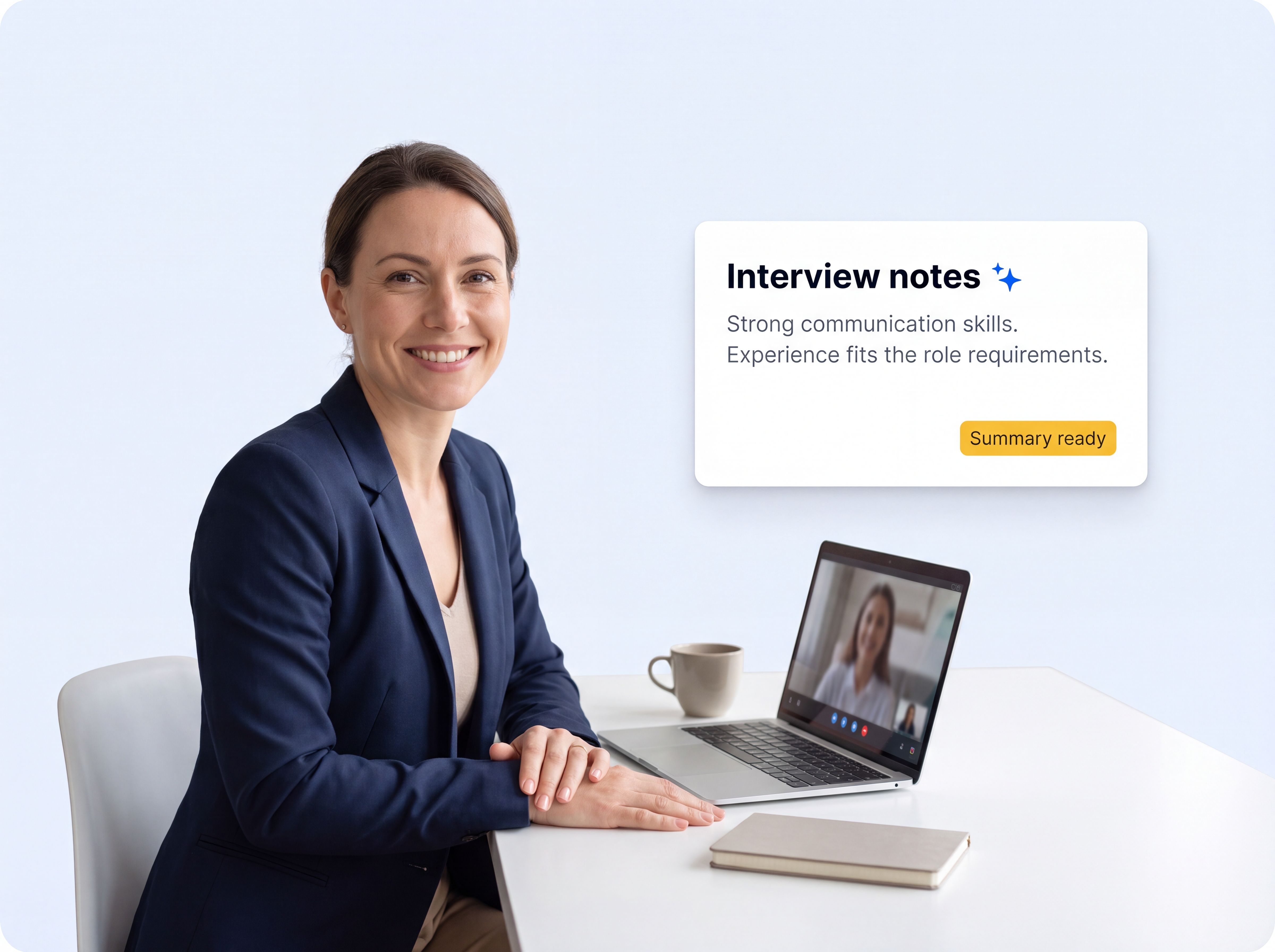 Recruiter smiling during a candidate video interview beside a HappyScribe interview-notes card with an AI summary ready