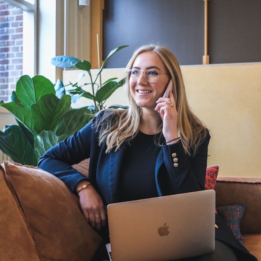 a woman making calls to get her Vimeo subscription done.