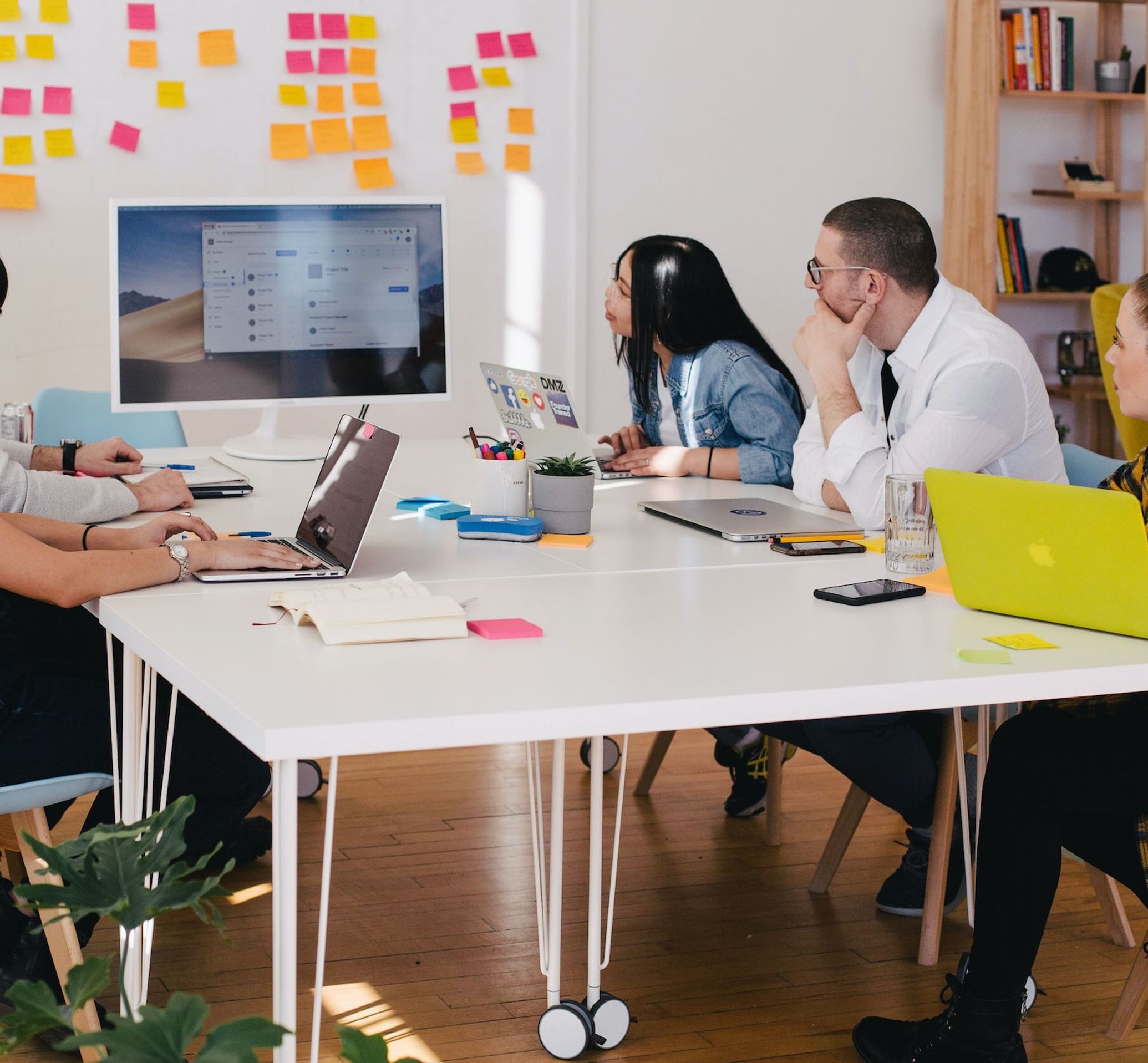 A team suggesting changes to tools used during meetings with transcription