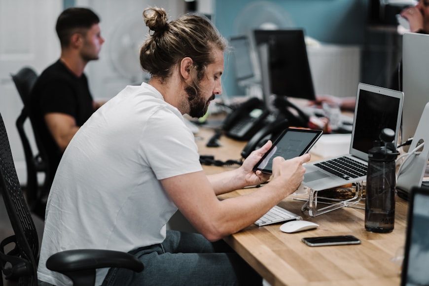 two interns creating content for impaired students