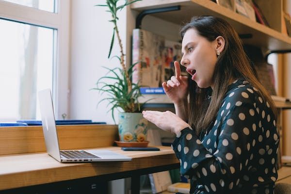 An impaired lady learning via video