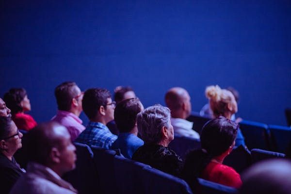 Group of people watching from an SRT file