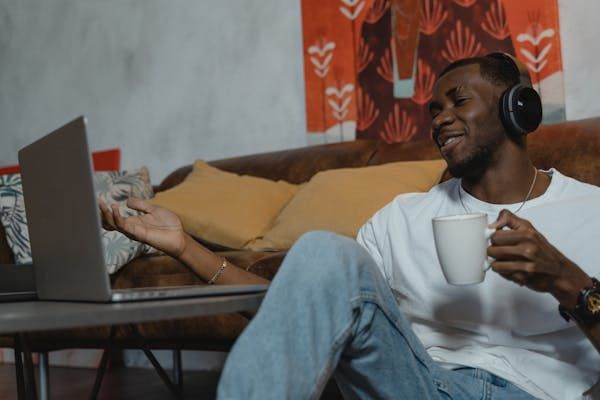 A man working with his colleagues on Google meet