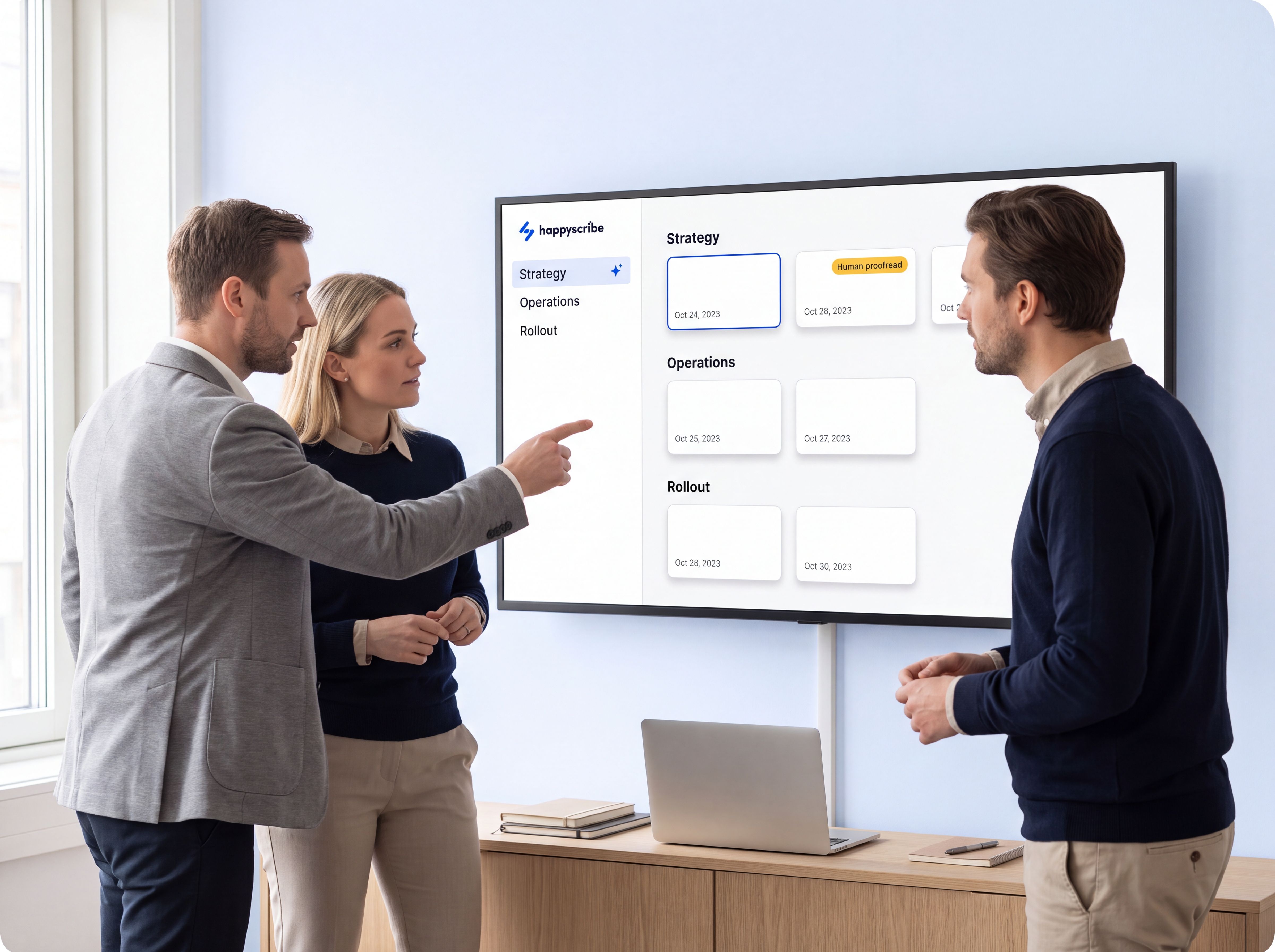 Consulting team reviewing shared engagement meeting notes in HappyScribe